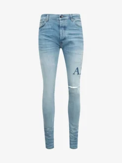 Jeans>AMIRI Starburst Applique Skinny Jean